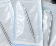 Sterilised instruments in sealed pouches